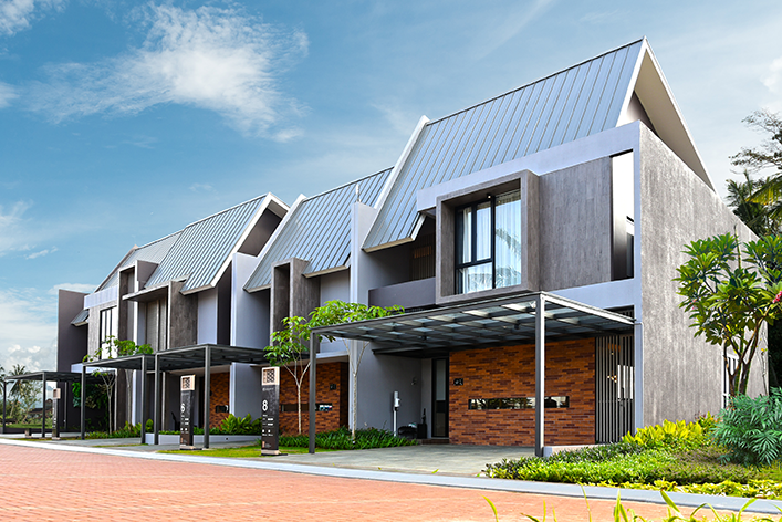 Rumah modern minimalis dengan taman depan dan garasi